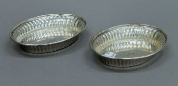 A pair of Sheffield plate bon bon dishes. 13 cm long.