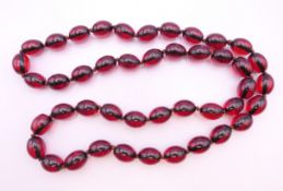 A bead necklace. 78 cm long.