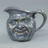 A silver plated John Barleycorn jug. 17 cm high.