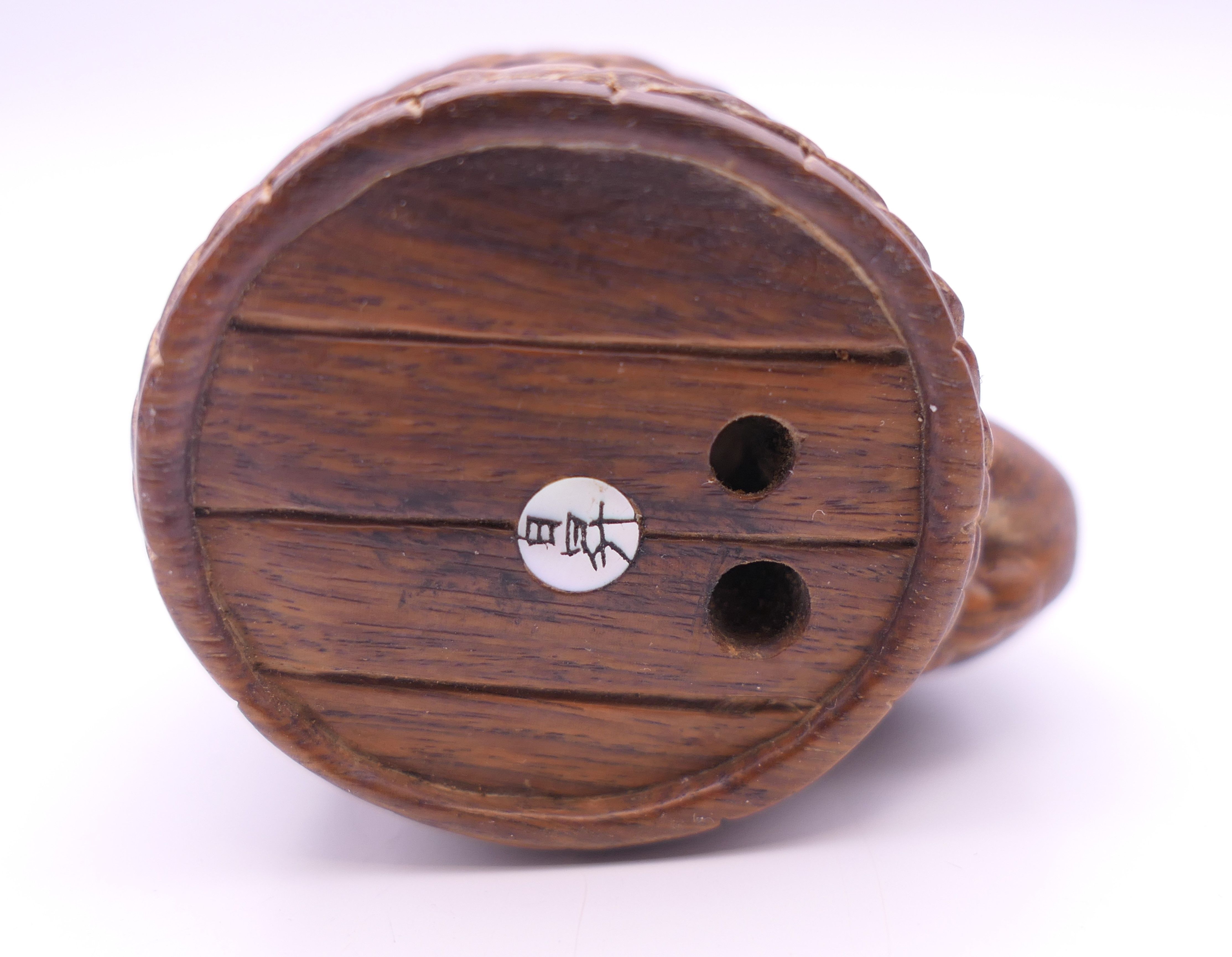 A netsuke formed as mice on a barrel. 3 cm high. - Image 3 of 3