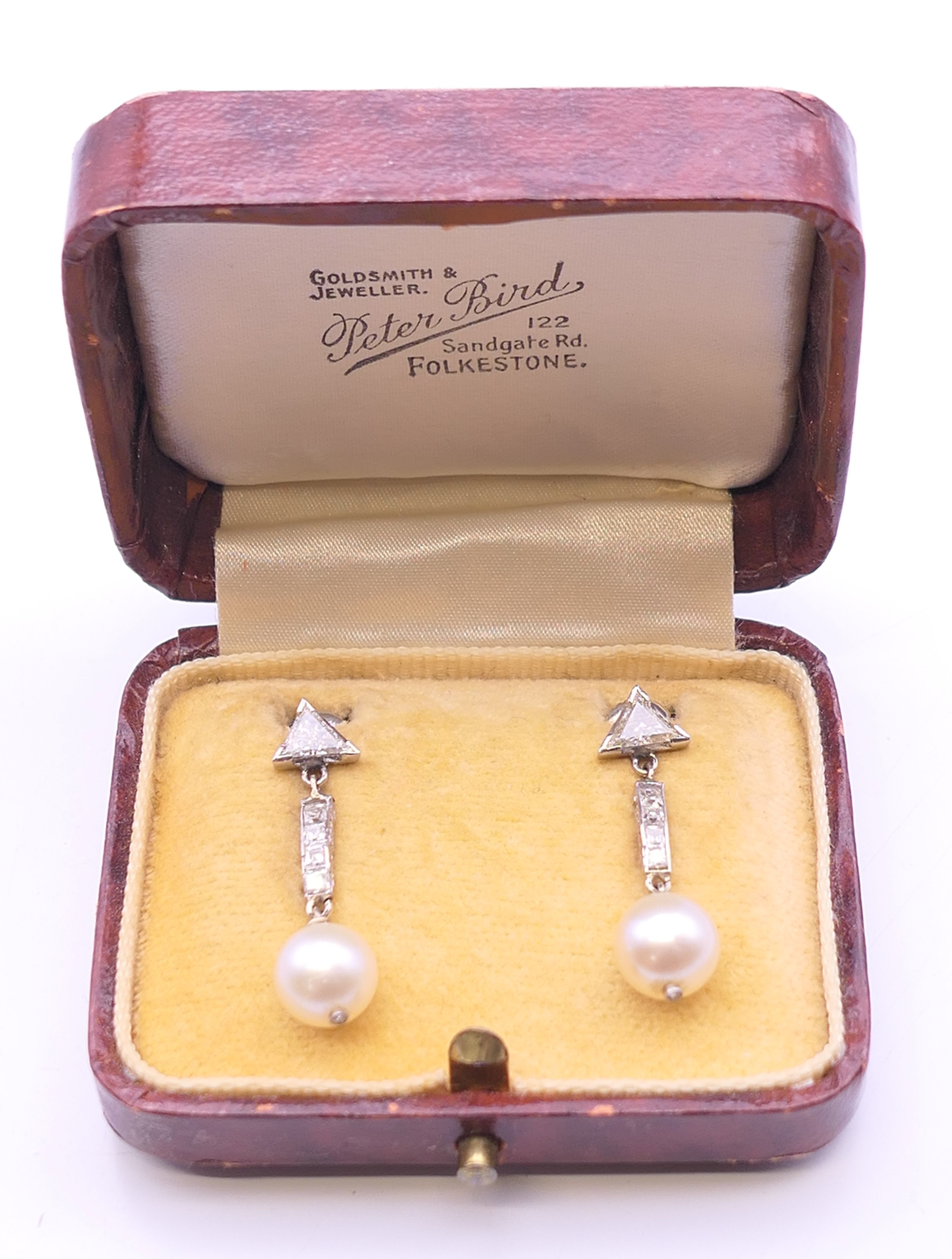 A pair of Art Deco diamond and pearl earrings. 3 cm high. - Image 6 of 7