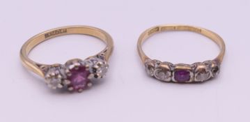 Two 18 ct gold and platinum diamond and ruby rings. 4.5 grammes total weight.