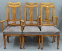 A set of six Art Nouveau dining chairs.