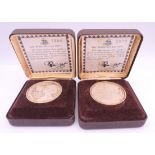 Two boxed Elizabeth II sterling silver Silver Jubilee commemorative medals.