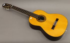 A Lorenzo acoustic guitar.