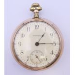 A gold plated open faced Waltham pocket watch. 5.5 cm diameter.