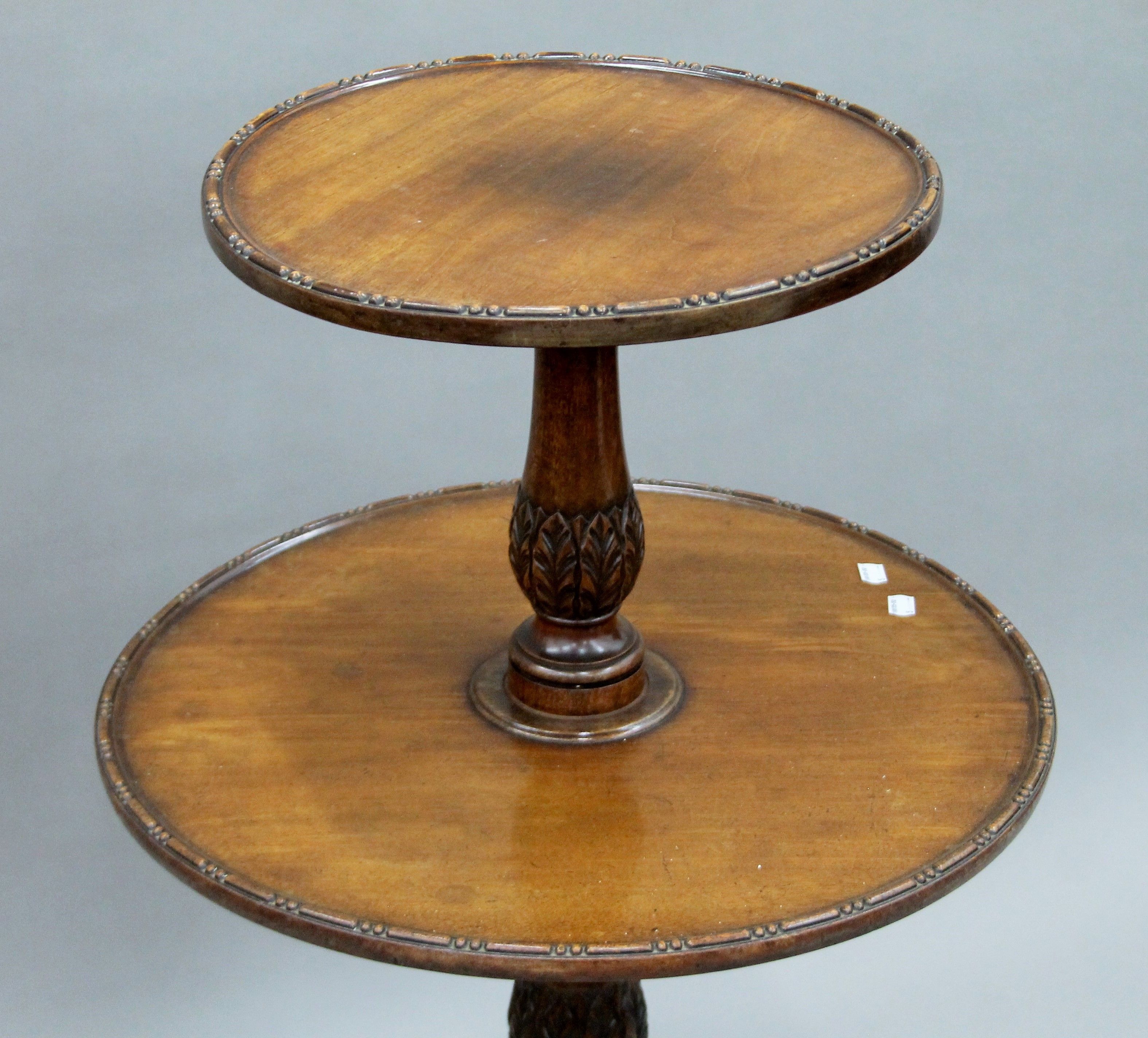 A mahogany two-tier dumb waiter. 100 cm high. - Image 2 of 4