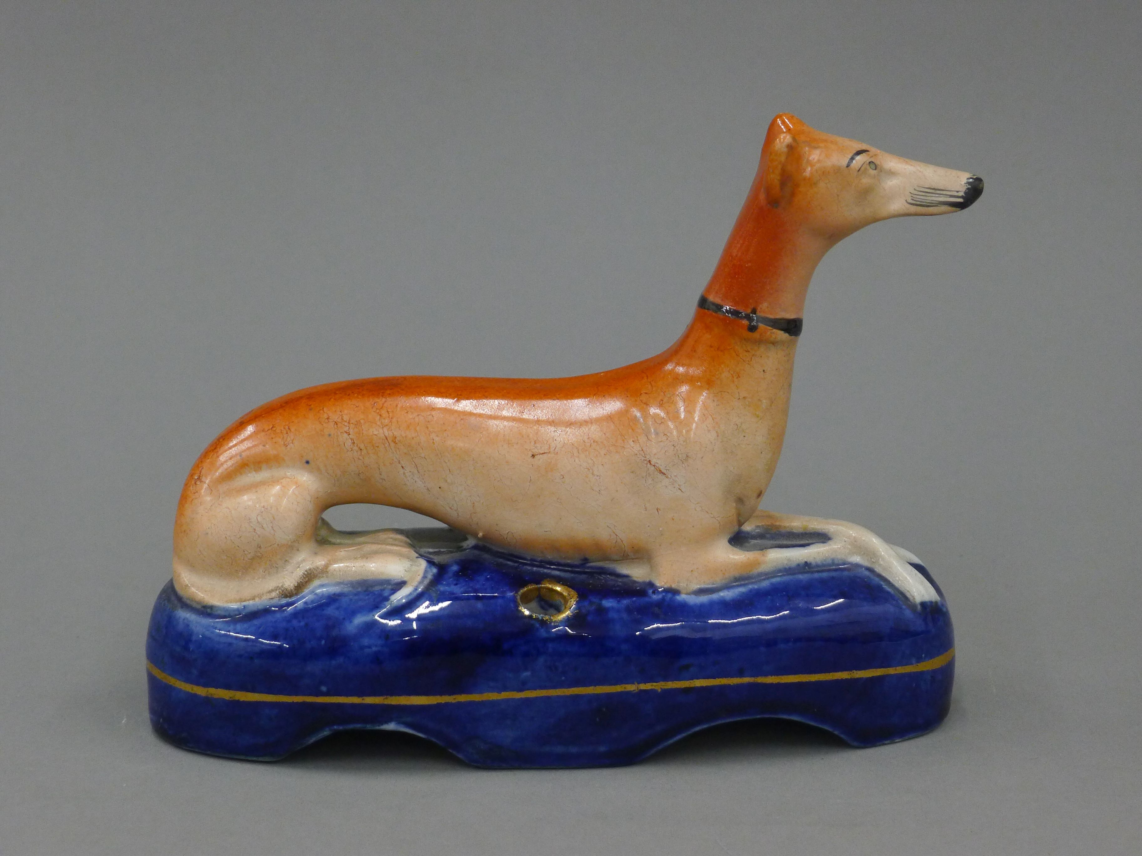 A pair of 19th century Staffordshire pottery models of coursing greyhounds, - Image 5 of 7