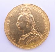 An 1887 jubilee head Victorian gold sovereign.