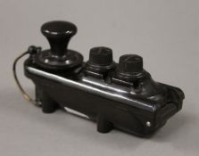 A WWII bathtub bakelite morse code tapper, used on Lancaster's, etc. 13 cm long.