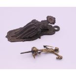 A Victorian letter clip and a small bronze figure formed as a Perseus. The former 11.5 cm long.