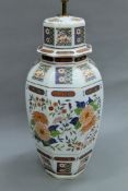 A Japanese porcelain lamp. 69 cm high excluding shade holder.