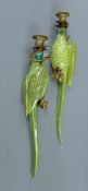 A pair of porcelain and gilt metal wall sconces formed as parrots. 47 cm high.
