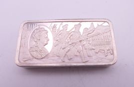 A silver 2 ounce ingot, hallmarked for London 1975, maker's mark of JP. 4.5 x 2.75 cm.