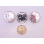 Three silver 2013 one ounce Britannia coins and a silver 1881 one dollar coin.