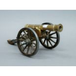 A model cannon. 31 cm long.