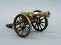 A model cannon. 31 cm long.