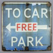 A 'To Free Car Park' double sided enamel sign. 53 x 53.5 cm.
