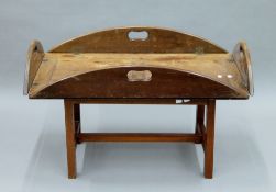 A butler's tray on stand. 86 cm long.
