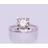 An 18 ct white gold diamond solitaire ring (diamond 1.