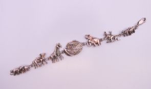 A silver Noah's Ark bracelet. 18 cm long.