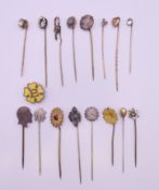 A collection of sixteen stickpins and a Primrose League badge. Primrose badge 2 cm diameter.