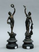 A pair of spelter figures. Each approximately 34 cm high.