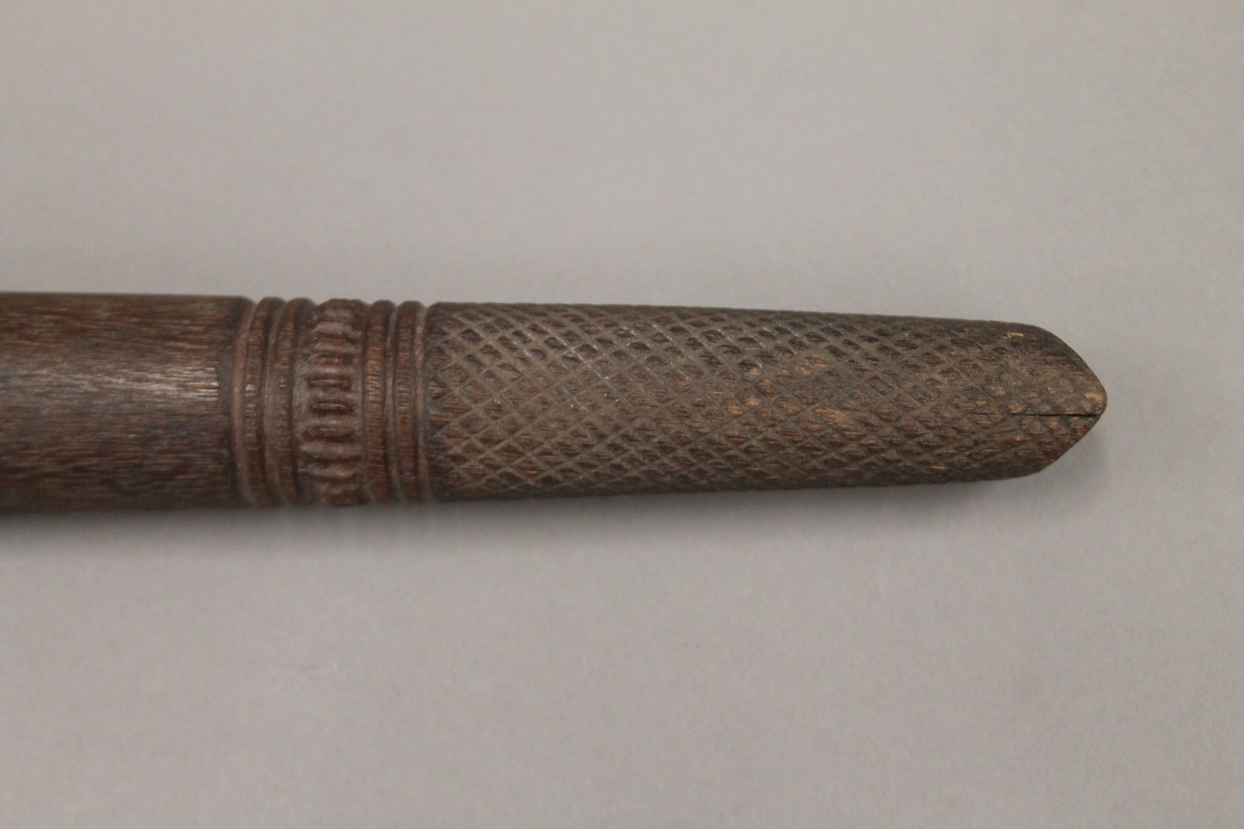 A South Seas carved wooden club. 103.5 cm long. - Image 3 of 3