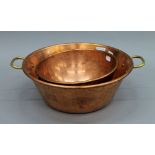 A copper preserve pan and a copper bowl. The former 43 cm wide.