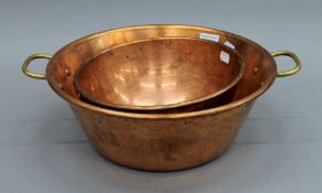A copper preserve pan and a copper bowl. The former 43 cm wide.
