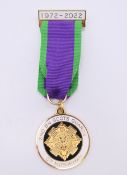 A 2nd BN Scots Guards OP Motorman medallion with ribbon. Medallion 3.25 cm diameter.