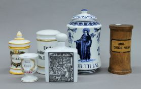 Three ceramic Apothecary jars with lids, a ceramic Apothecary's cup,