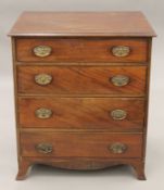 A George III and later mahogany chest of drawers. 65 cm wide.