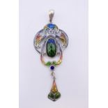 An Art Nouveau style pendant. 5.5 cm high excluding suspension loop.