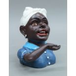 A female bust cast iron money box. 17 cm high.