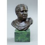 A small bronze bust of a gentleman on a plinth base. 14 cm high.