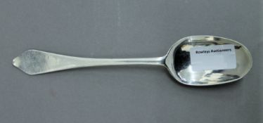 A Queen Anne silver rattail dog nose tablespoon, makers mark of Gabriel Sleath, London 1709.