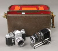 An Edixa Wirgin 35 mm camera Westernar 1:2.8/50 mm lens and an Orestor 2.