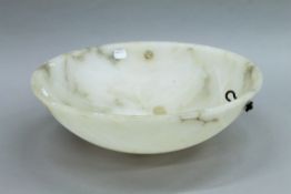 An alabaster plafonnier. 39.5 cm diameter.