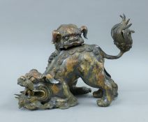 A Chinese bronze dog-of-fo censer. 25 cm high.