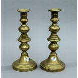 A pair of Georgian Scottish brass candlesticks,