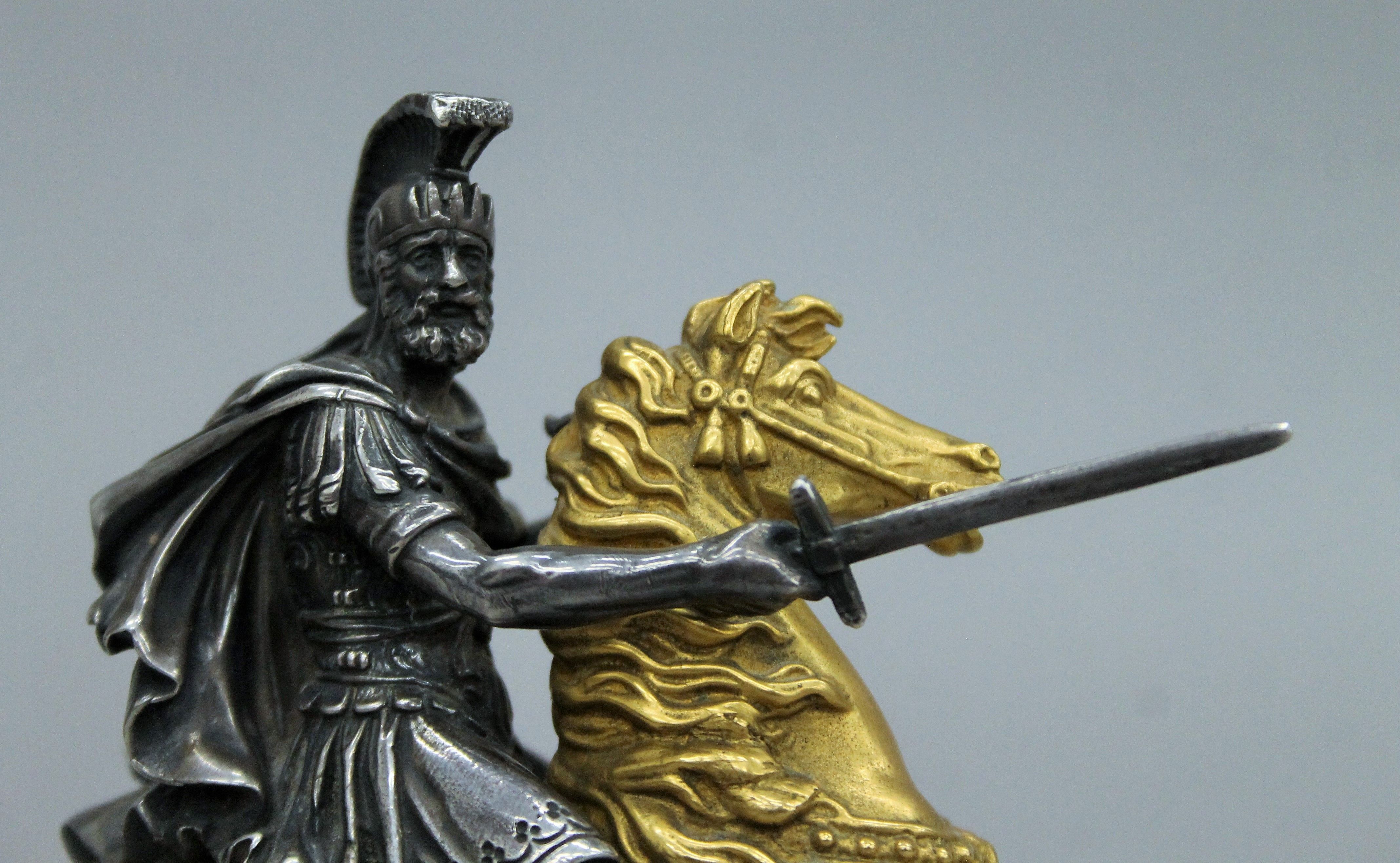A 19th century gilt and silvered bronze model of a warrior on horseback. 11 cm high. - Image 3 of 4
