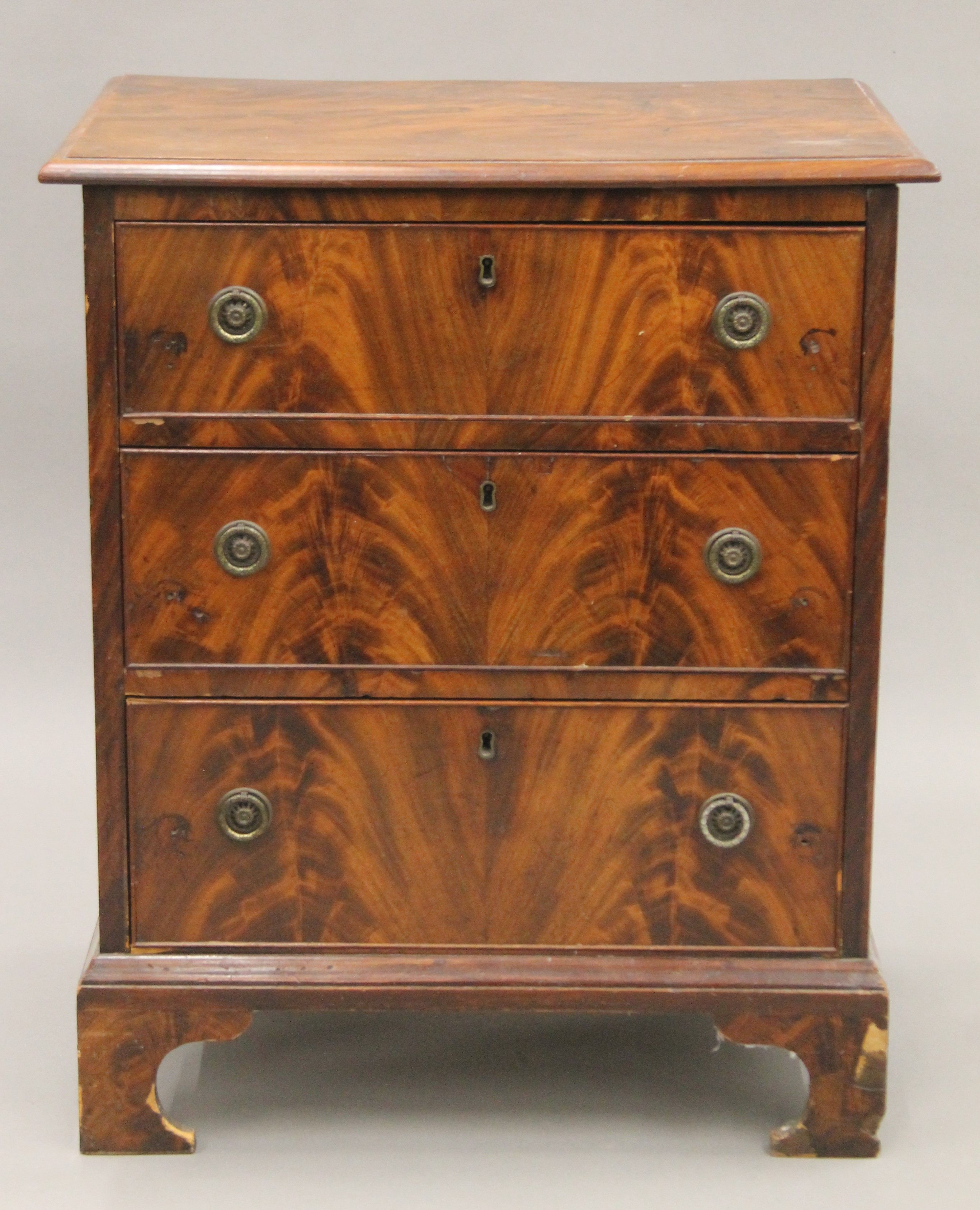 A George III mahogany chest (adapted). 61 cm wide.