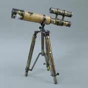 A small telescope and stand. 27 cm long.
