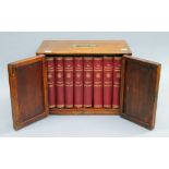 A cased set of Harmsworth Encyclopedia housed a mahogany box. 40 cms wide.