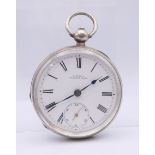 A Waltham silver open face pocket watch. 5.25 cm diameter.