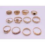 Twelve assorted rings (ten marked 9 ct, one marked 14 ct and one indistinct). 36.6 grammes.
