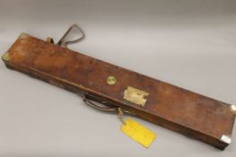 A Victorian James Purdey and Sons brass mounted oak and leather rifle case with maker's label to