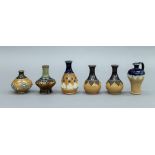 Six miniature Doulton vases. The largest 7.5 cm high.