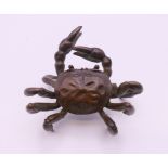 A bronze model of a crab. 6 cm wide.